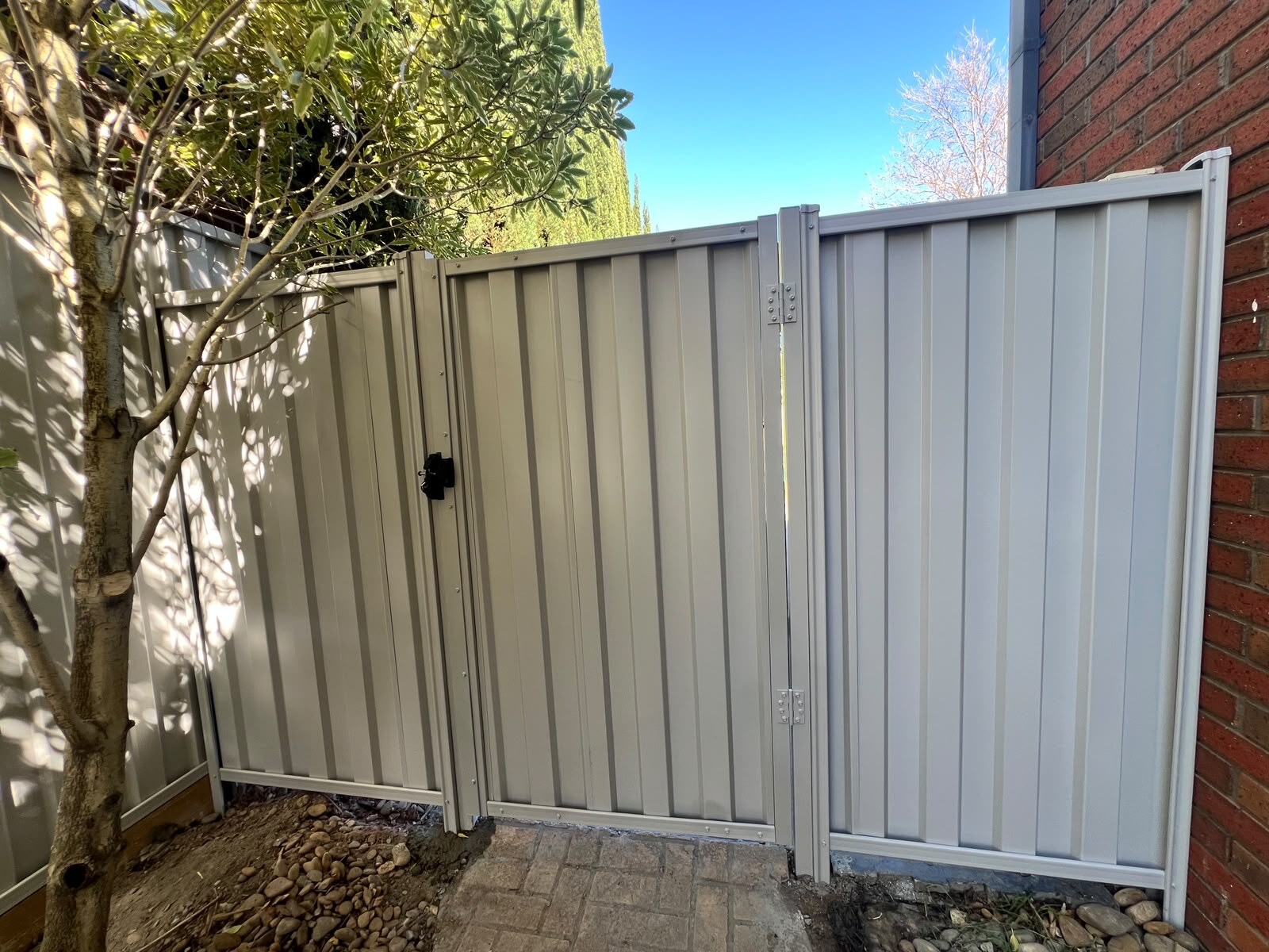 Completed Shale Grey COLORBOND fence in Bentleigh