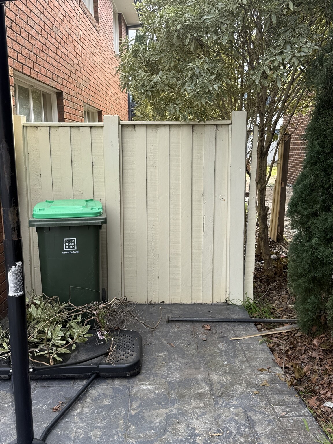 Old timber fence and gate before replacement in Bentleigh