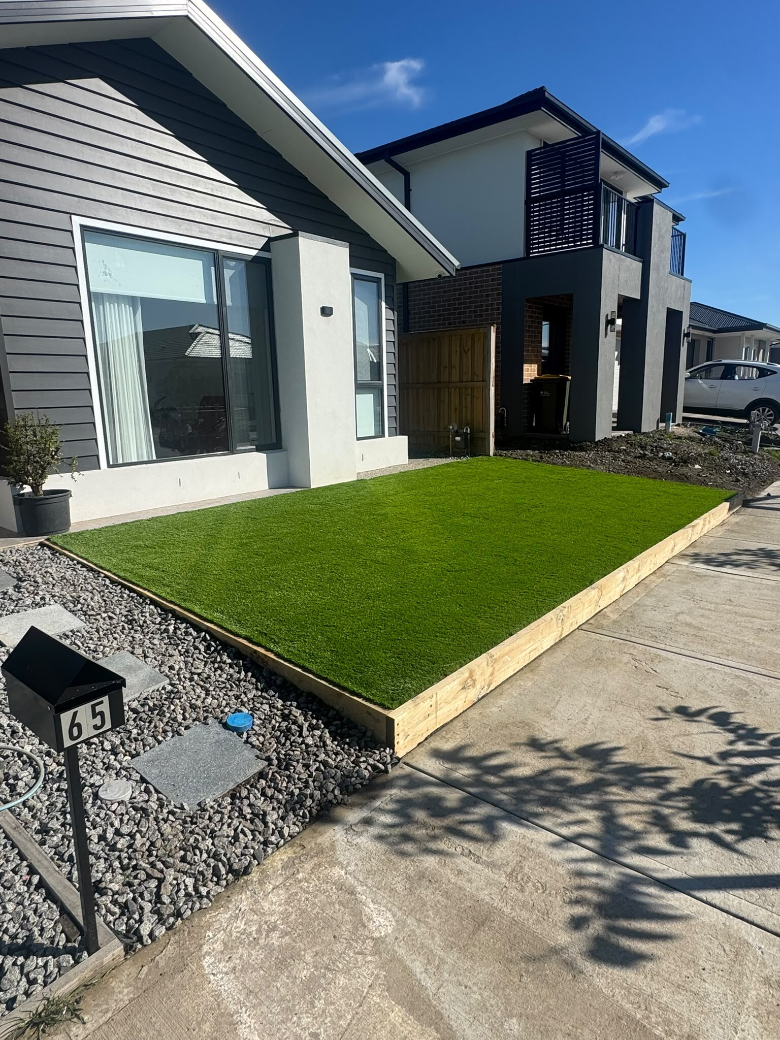 Completed artificial grass installation in a Donnybrook front yard